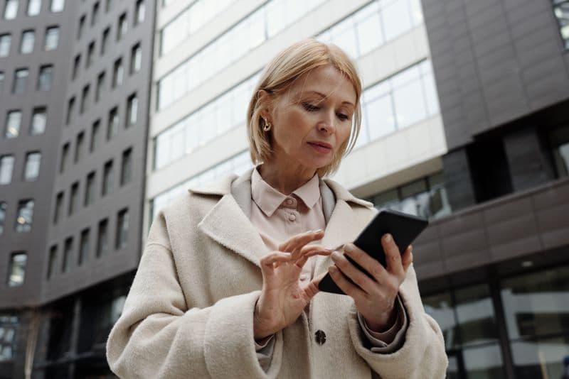 Business owner checking a mobile phone