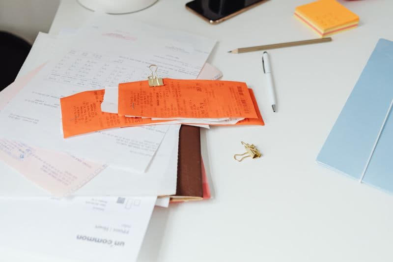 Paper receipts and documents on a desk